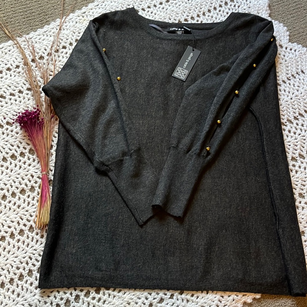 Dressy top with gold accents